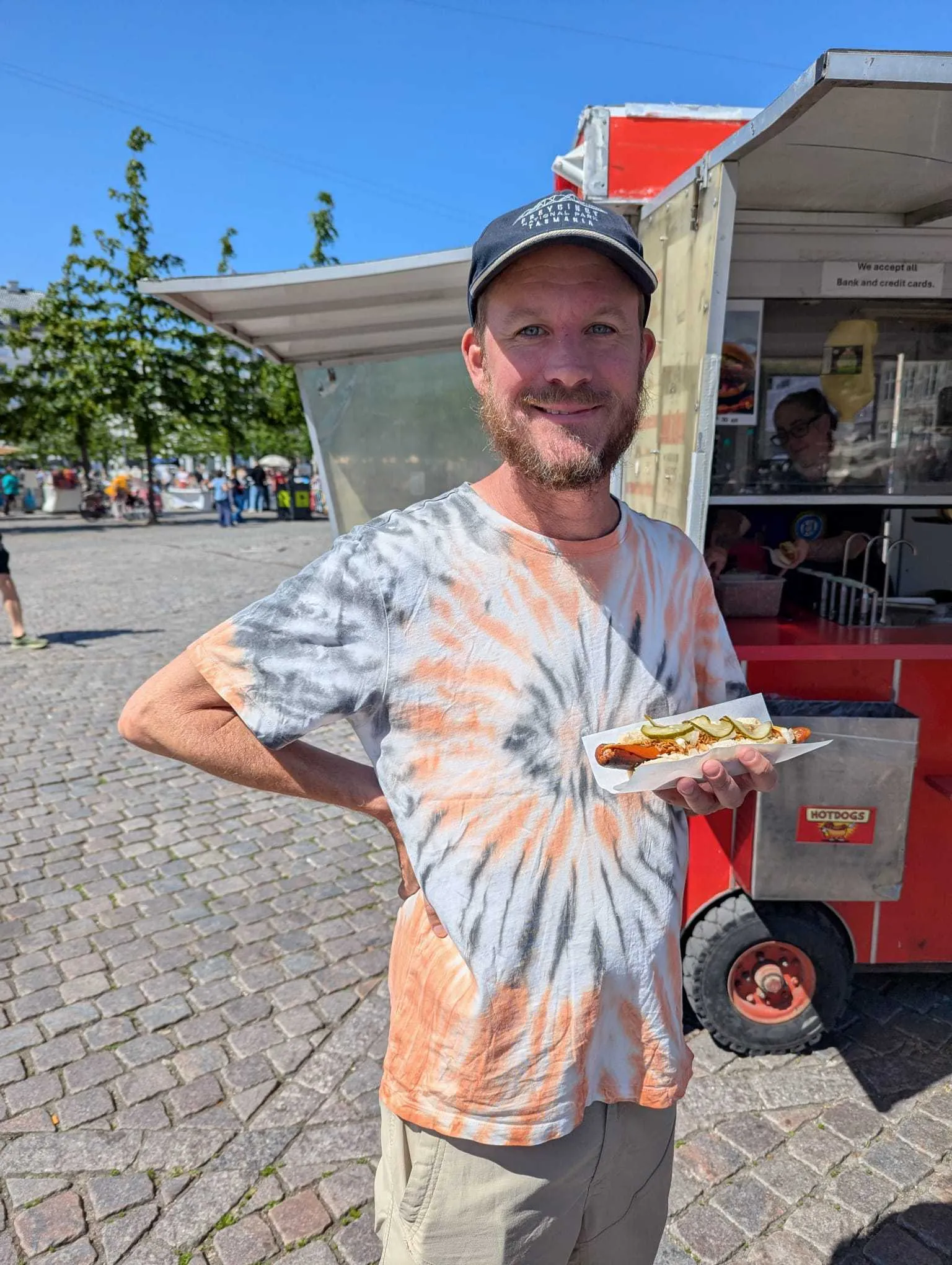 Stu eating a hot dog
