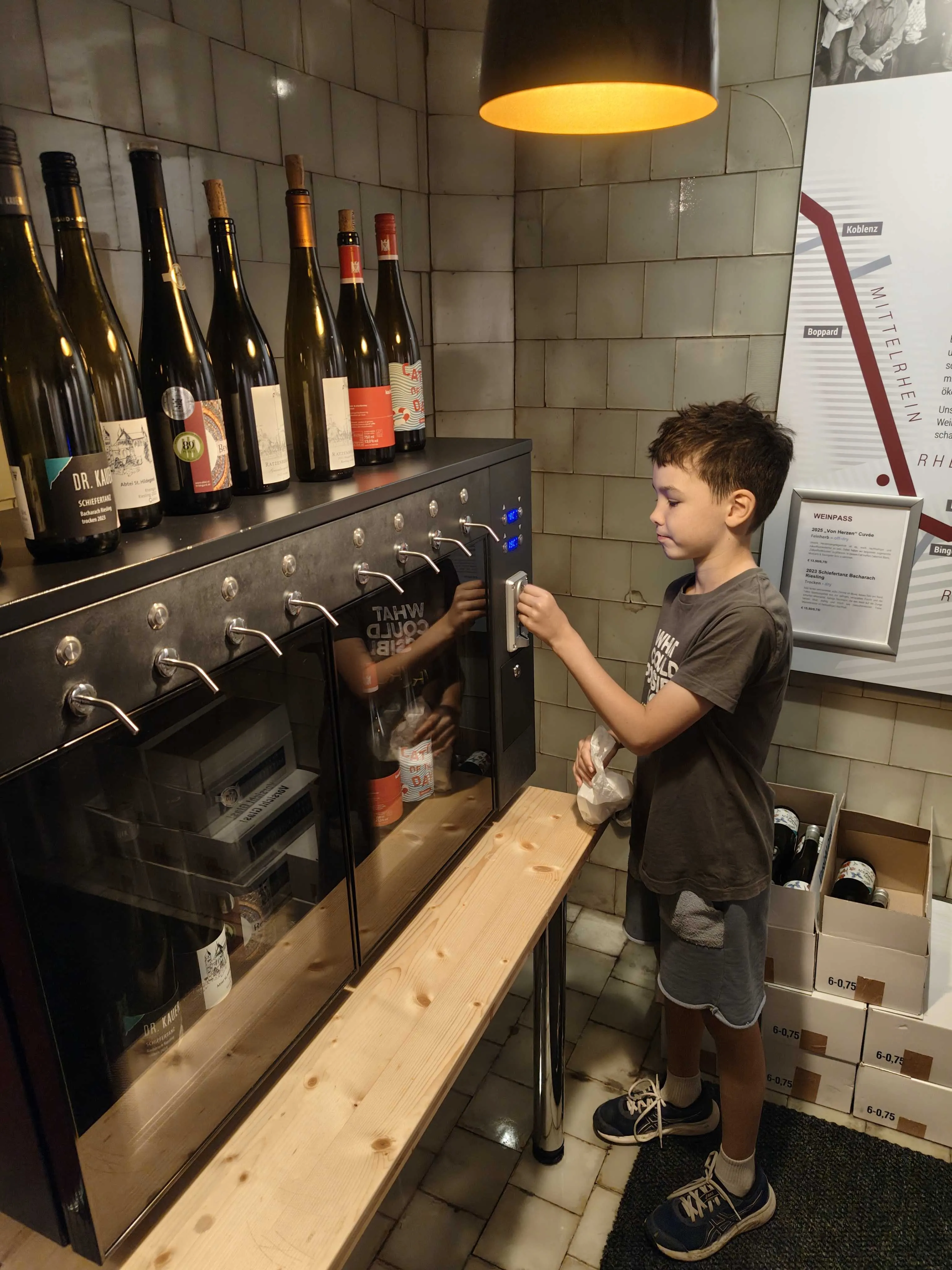 Miles operating the wine tasting machine