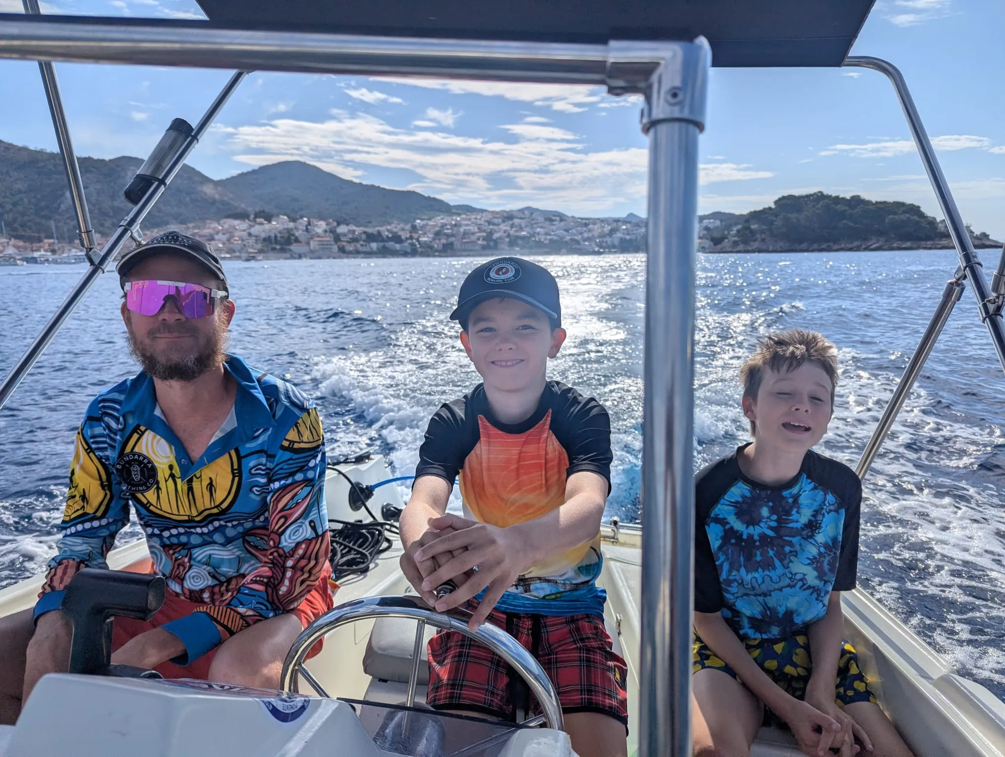 Stu, Miles and Jake on the boat